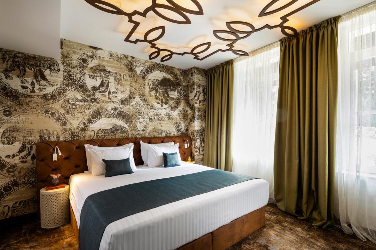 Gallery 37 Powered By Aston Пловдив Экстерьер фото A room at the hotel